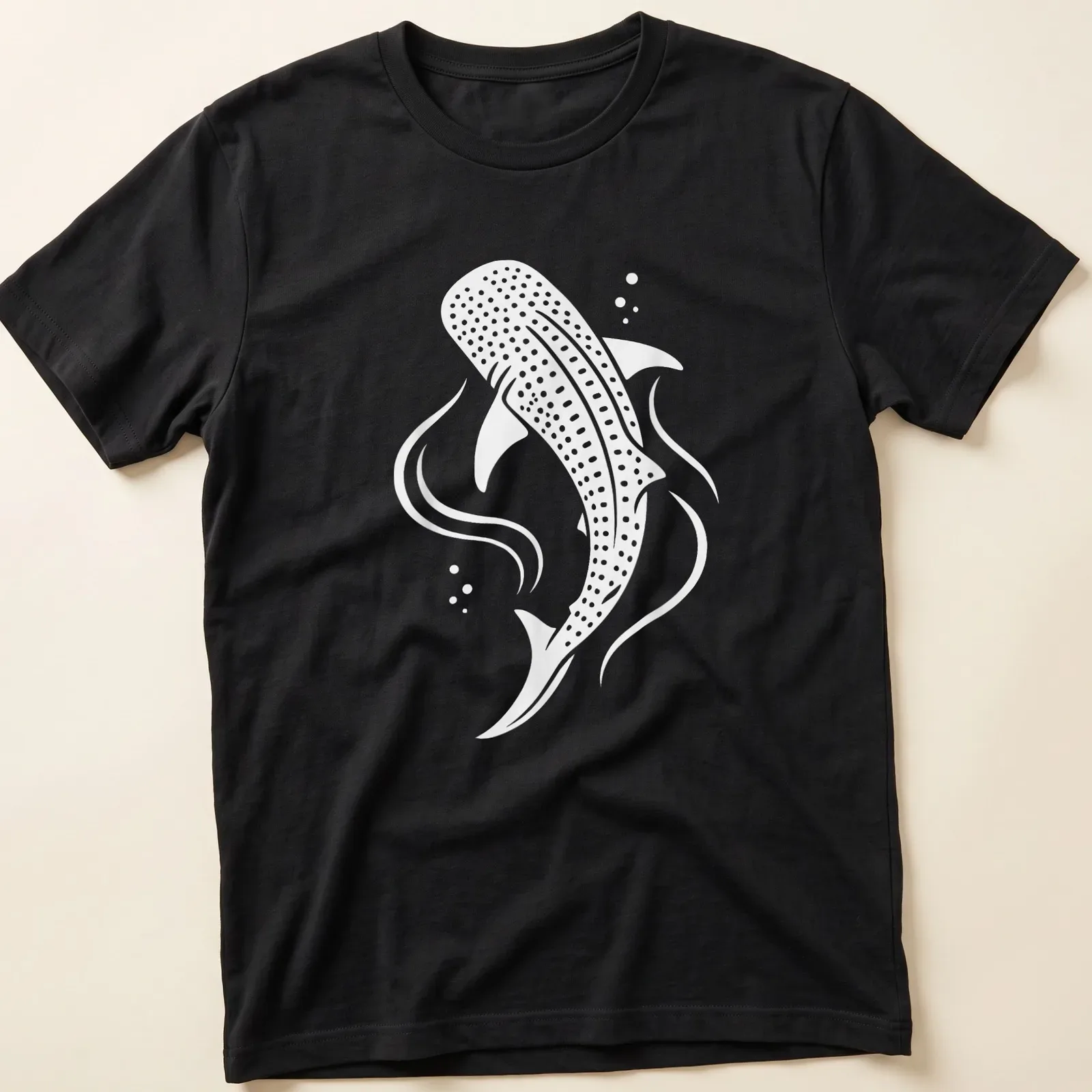 Minimalist print of a whale shark swimming in white and light gray. — printed on a unisex t-shirt