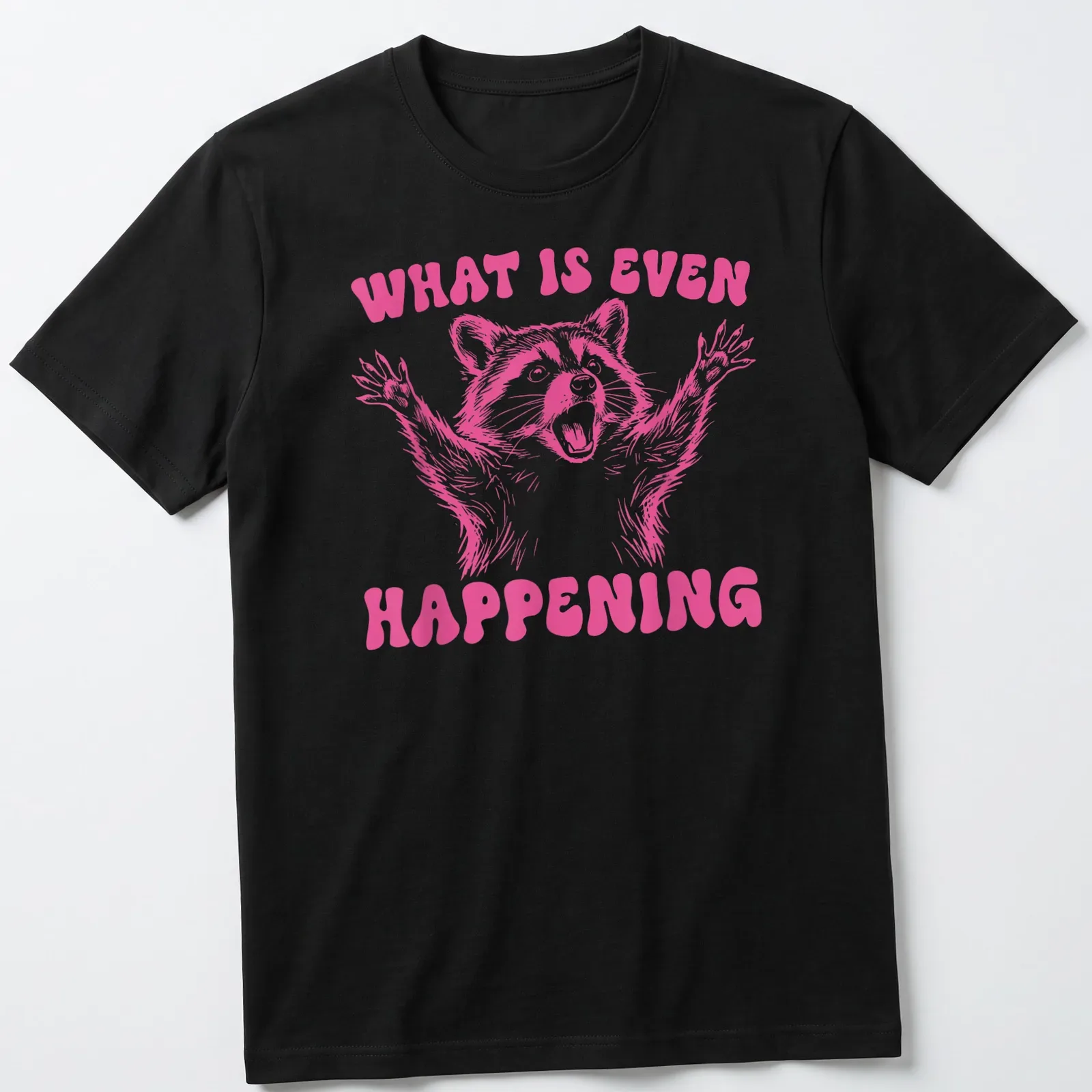 Vintage-style pink t-shirt featuring a quirky raccoon and humorous text — printed on a unisex t-shirt