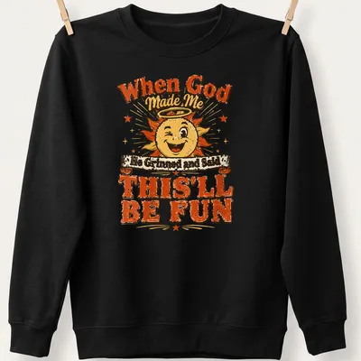 Vibrant cartoon sun with halo and a joyful quote about fun — printed on a unisex sweatshirt