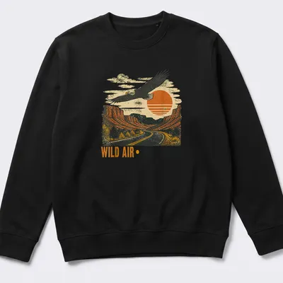 Retro design featuring an eagle soaring over a landscape with vintage colors — printed on a unisex sweatshirt