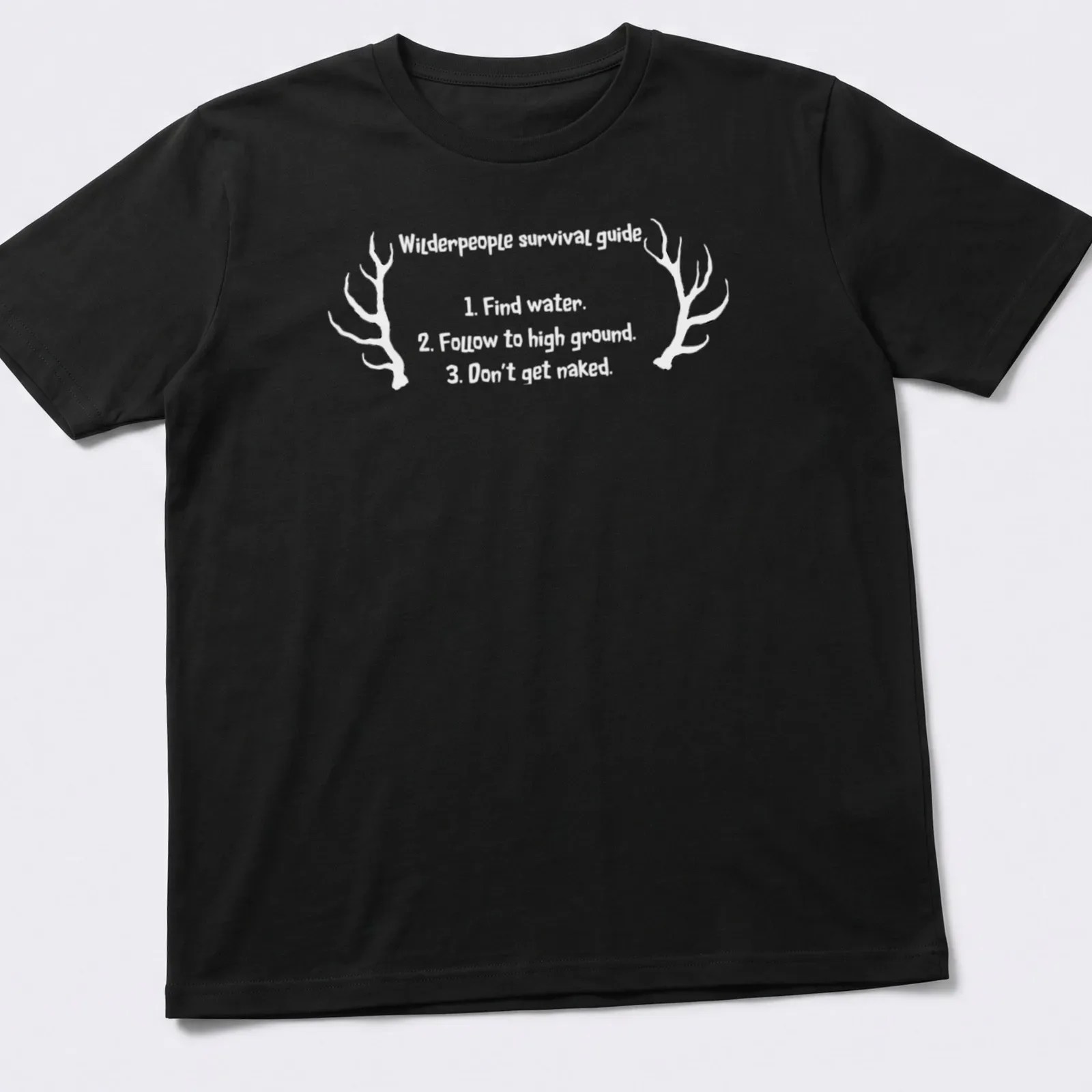 Vintage style shirt with antlers and humorous survival tips printed in black and white — printed on a unisex t-shirt