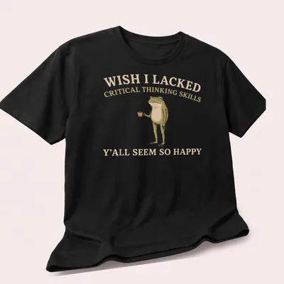 Illustrative graphic of a frog with humorous text about critical thinking — printed on a unisex t-shirt (angled view)
