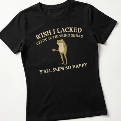 Illustrative graphic of a frog with humorous text about critical thinking — printed on a women's shirt
