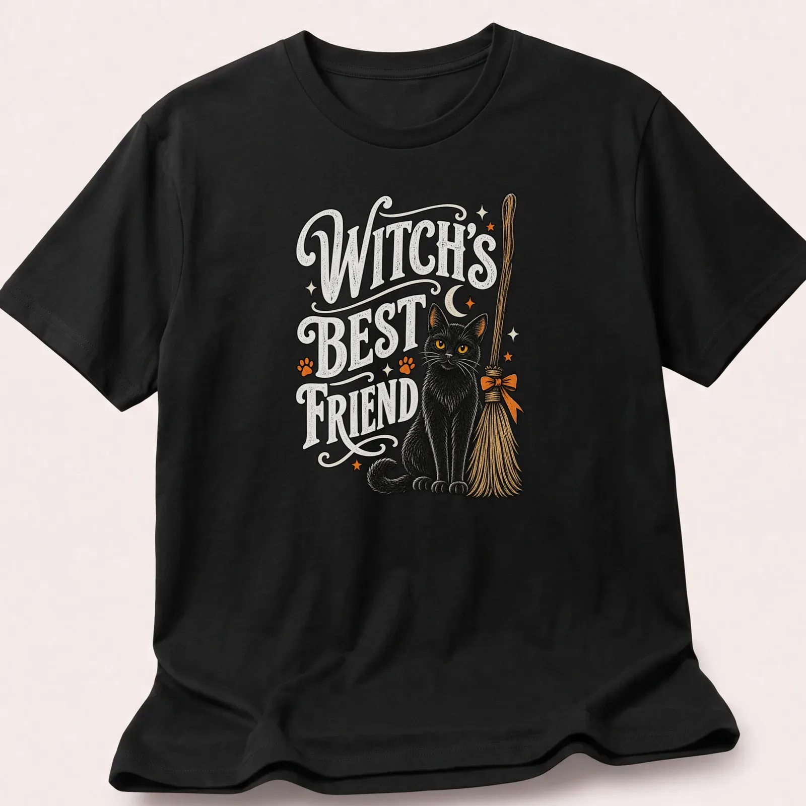 Vintage illustration of a black cat on a broom with Halloween text — printed on a unisex t-shirt