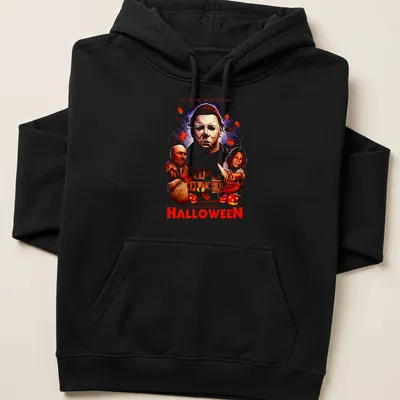Vintage horror shirt featuring Michael Myers with bold text about Halloween. — printed on a unisex hoodie