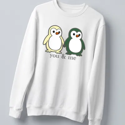Cute cartoon of two penguins holding flippers with text above. — printed on a unisex sweatshirt