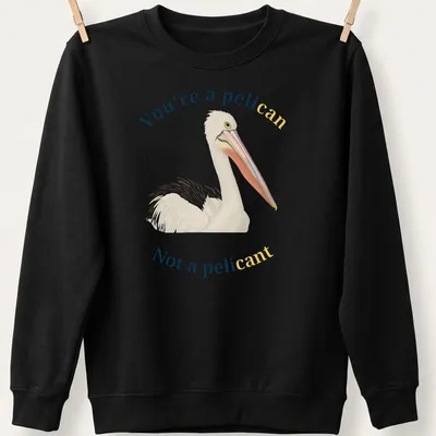 Illustrative design featuring a pelican with humorous text about being a pelican, not a pelicant. — printed on a unisex sweatshirt