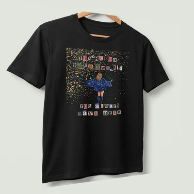 Colorful confetti design with sparkly text: You're On Your Own, Kid — printed on a unisex t-shirt (angled view)